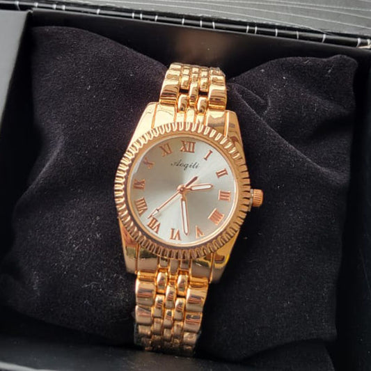 Classic Gold Tone Women's Watch with Roman Numerals - Elegant and Timeless